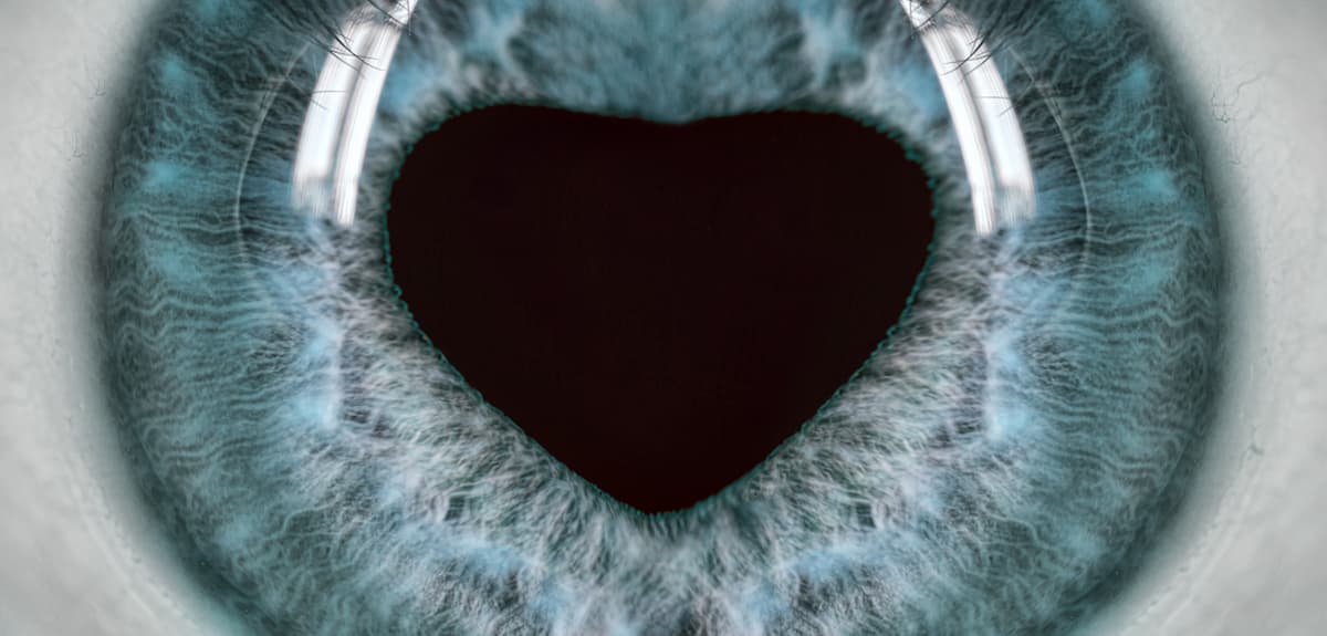 Closeup of eye with heart-shaped pupil Image credit: AdobeStock/AlexanderPotapov
