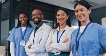 Four doctors standing in line Image credit: ©LuxeShutter/peopleimages.com - adobe.stock.com