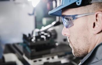 Man wearing eye protector glasses Image credit: AdobeStock/TomaszZajda