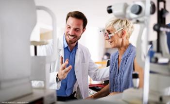 Optometrist conducting vision test with patient Image credit: ©NDABCREATIVITY - adobe.stock.com