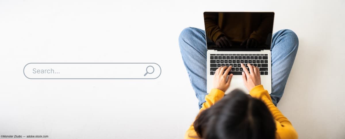 Woman searching Google on laptop Image credit: AdobeStock/MonsterZtudio