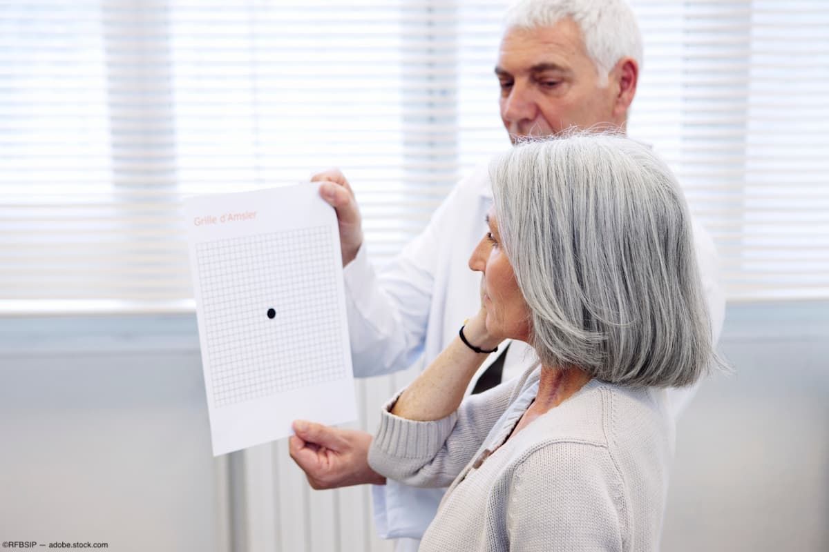 Doctor administering AMD Amsler grid exam Image credit: AdobeStock/RFBSIP
