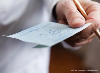 Doctor Holding Prescription (Adobe Stock / DW labs Incorporated)