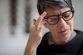 Woman wearing glasses rubbing eye Image credit: AdobeStock/CavanforAdobe