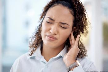 Woman touching ear in pain Image credit: ©Rene La/peopleimages - adobe.stock.com