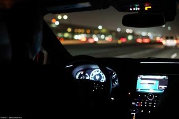 Person driving at night Image credit: AdobeStock/nd700