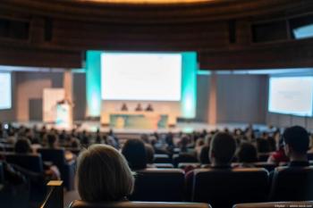Audience at a panel event Image credit: AdobeStock/Aydan