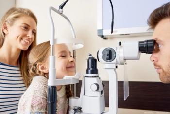 Child undergoing eye exam with slit lamp Image credit: ©Seventyfour - adobe.stock.com