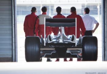 Pit crew stands in front of F1 car Image credit: Martin Barraud/KOTO - adobe.stock.com