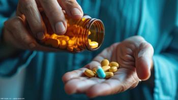 Pills being poured into hand Image credit: AdobeStock/MPStudio/AI