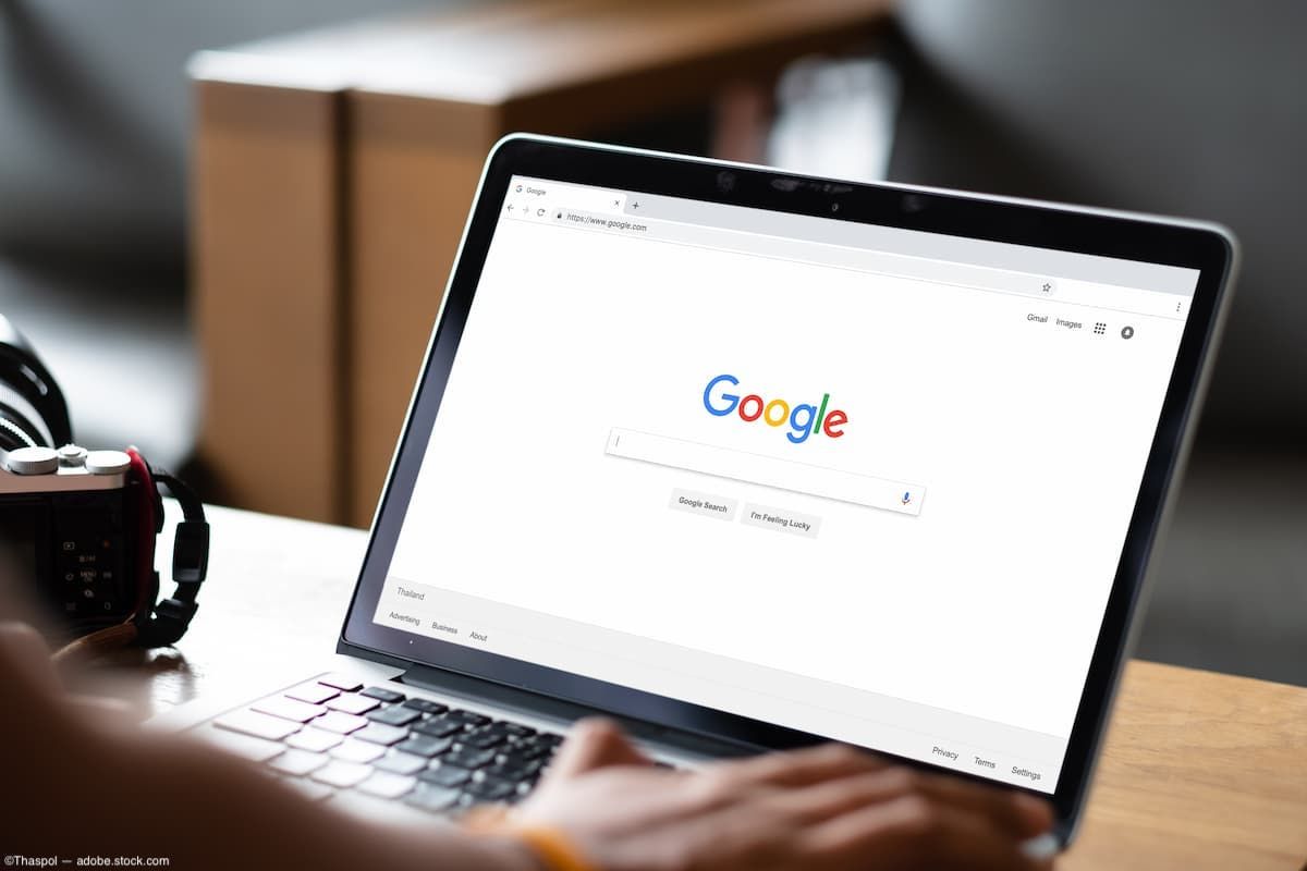 Person using Google at desk on computer Image credit: AdobeStock/Thaspol