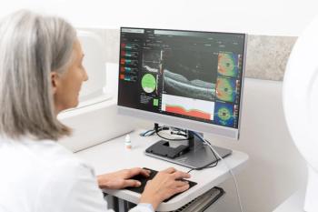Physician viewing OCT scans Image credit: AdobeStock/MariaVitkovska