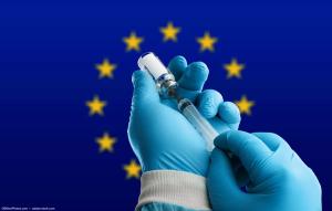 Filling needle with vial in front of EU flag Image credit: ©BillionPhotos.com - adobe.stock.com