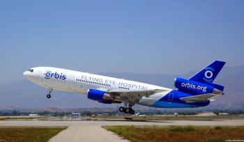 Orbis Flying Eye Hospital plane taking off at airport Image credit: Orbis International