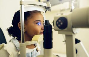 Child receiving eye exam Image credit: AdobeStock/NF/peopleimages.com