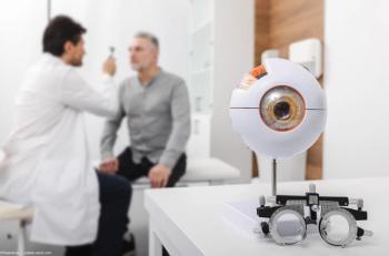 Physician examining patient's eyes Image credit: AdobeStock/Peakstock