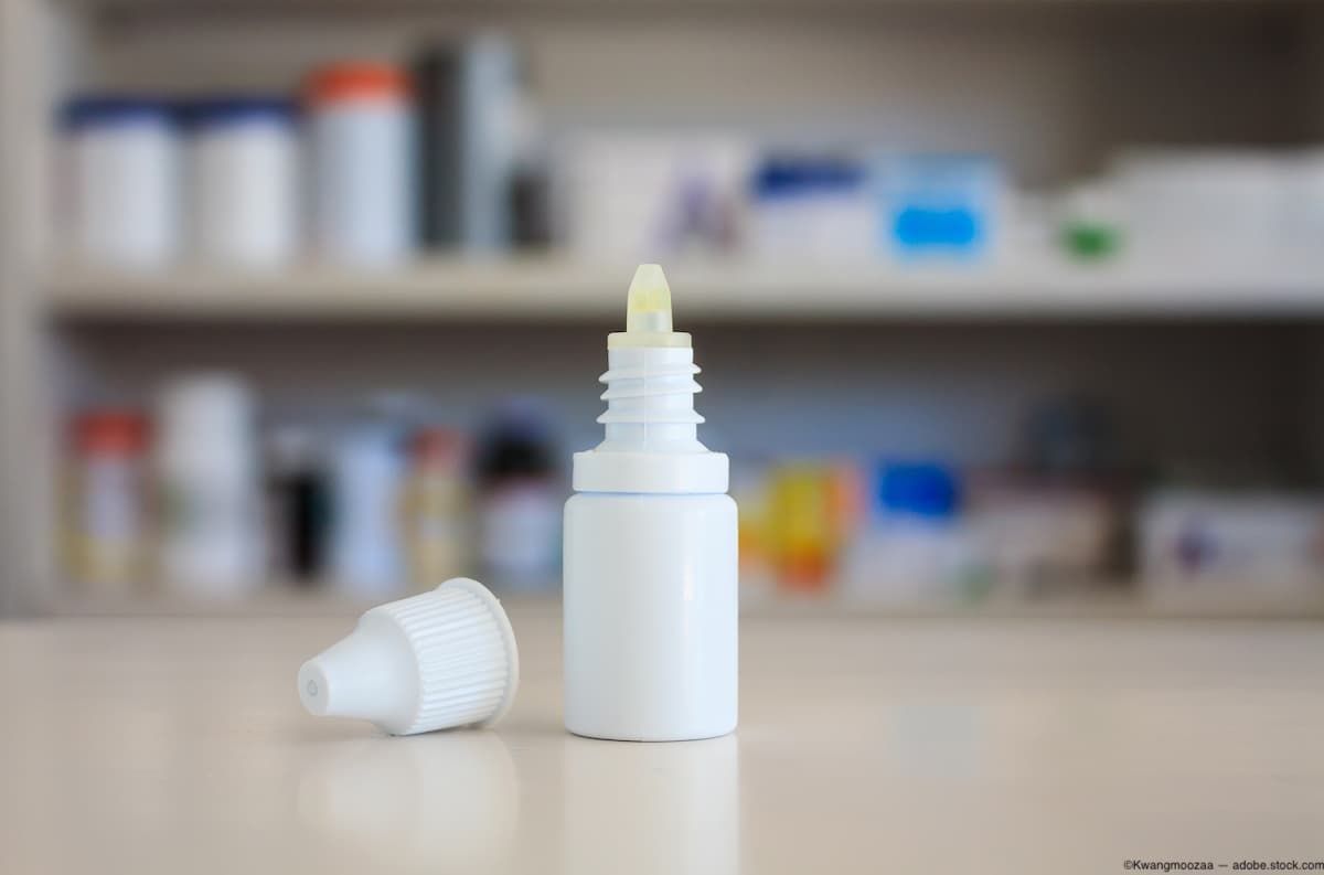 Eye drop application bottle on table. Image credit: AdobeStock/Kwangmoozaa