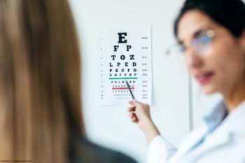 Physician testing visual acuity in patient Image credit: AdobeStock/nenetus