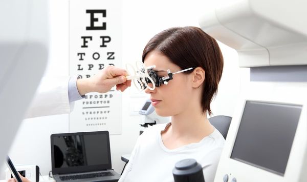 Patient receiving eye exam Image credit: AdobeStock/amedeoemaja