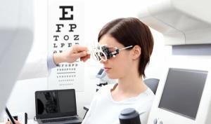 Patient receiving eye exam Image credit: AdobeStock/amedeoemaja