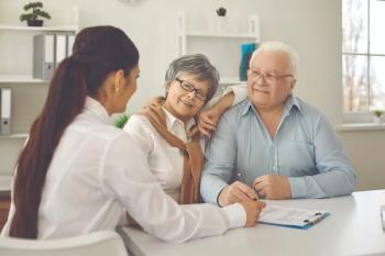 Family talking to doctor Image credit: AdobeStock/StudioRomantic
