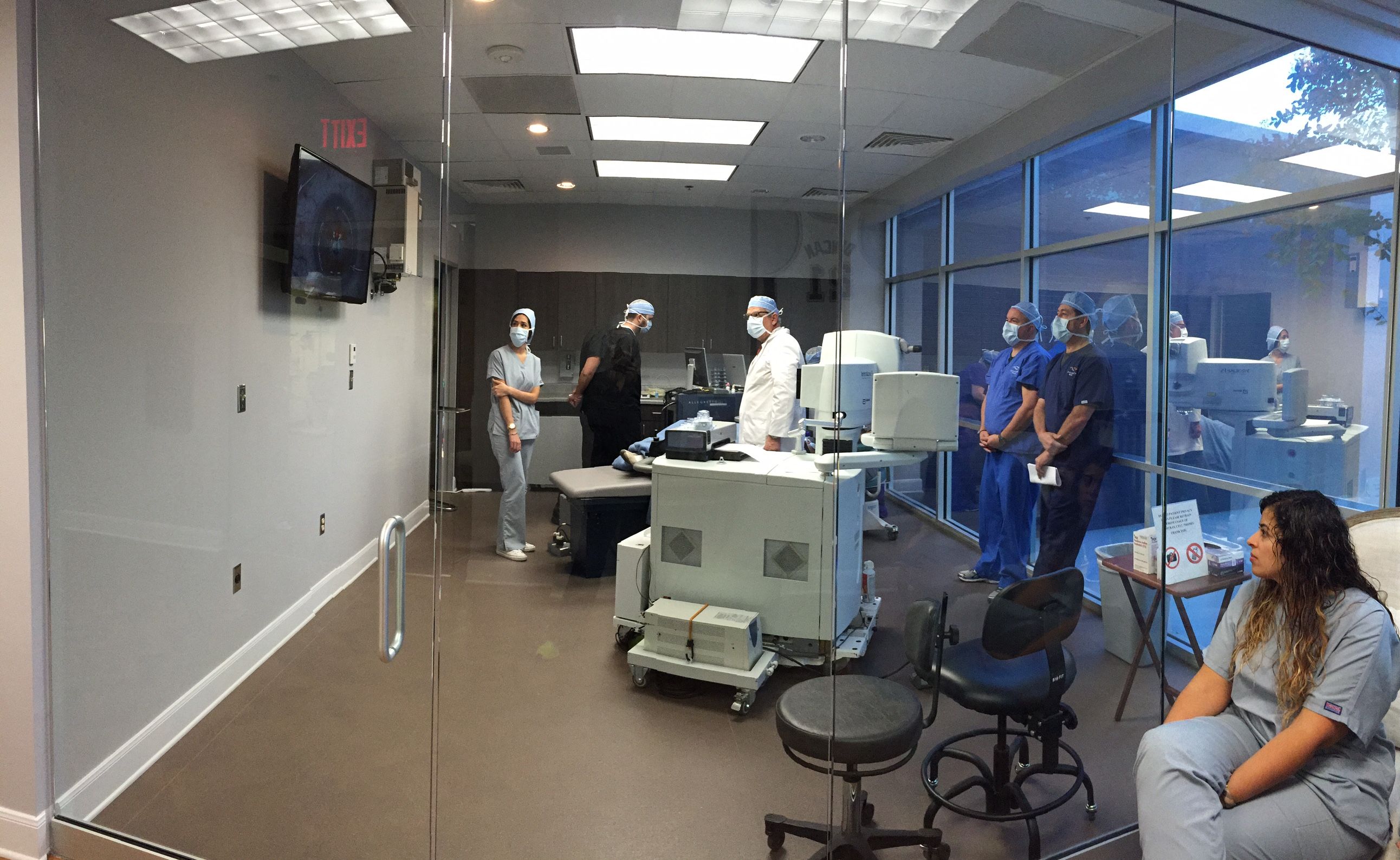 Figure 2. Students observing a LASIK surgery in the on-campus surgical suite.