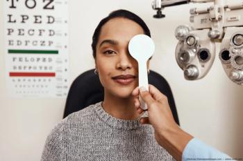 Woman taking visual acuity test Image credit: ©Nicholas Felix/peopleimages.com