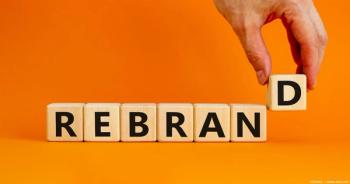 Wooden blocks spelling out "rebrand" Image credit: ©Dzmitry - adobe.stock.com