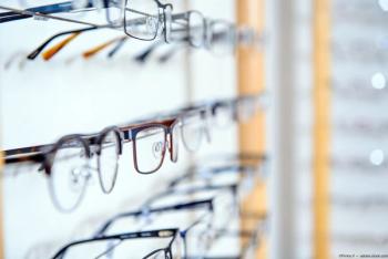 Wall of glasses in opticians office Image credit: AdobeStock/FirmaV
