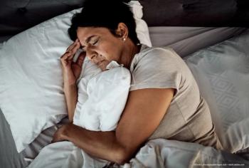 Woman experiencing sleep dysfunction due to visual impairment. - Image credit: ©David Lahoud/peopleimages.com—stock.adobe.com
