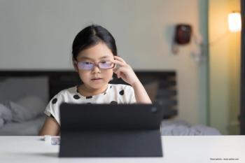 Child with myopia is evaluated for lens thickness and power changes before and after myopia onset - Image credit: Adobe Stock / ©kornnphoto