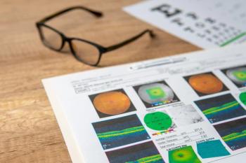OCT images on paper on desk Image credit: AdobeStock/izzuan