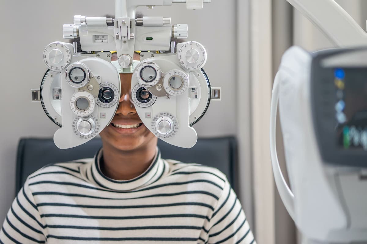 Child doing phoropter test Image credit: AdobeStockthebigland45