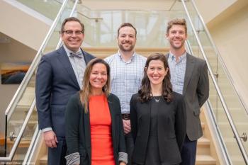 SCO's 2024 winners of the Practice Excellence Award on a staircase Image credit: Southern College of Optometry