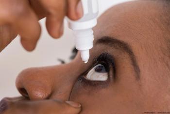 Woman administering eye drops Image credit: AdobeStock/AndreyPopov