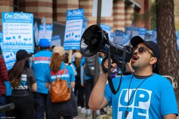 Man with bullhorn at UPTE-CWA 9119 strike Image credit: UPTE-CWA9119