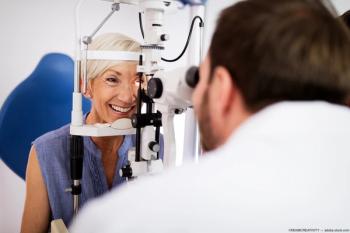 Doctor conducting eye exam on patient Image credit: AdobeStock/NDABCREATIVITY