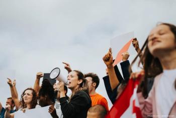 Group of protesters with signs and bullhorns Image Credit: ©Rawpixel.com - adobe.stock.com