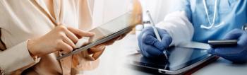 Clinical researchers on tablets Image credit: AdobeStock/ARMMYPICCA