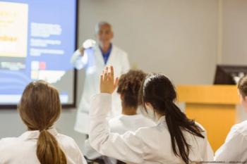 Medical students sitting in lecture Image credit: AdobeStock/WavebreakMediaMicro