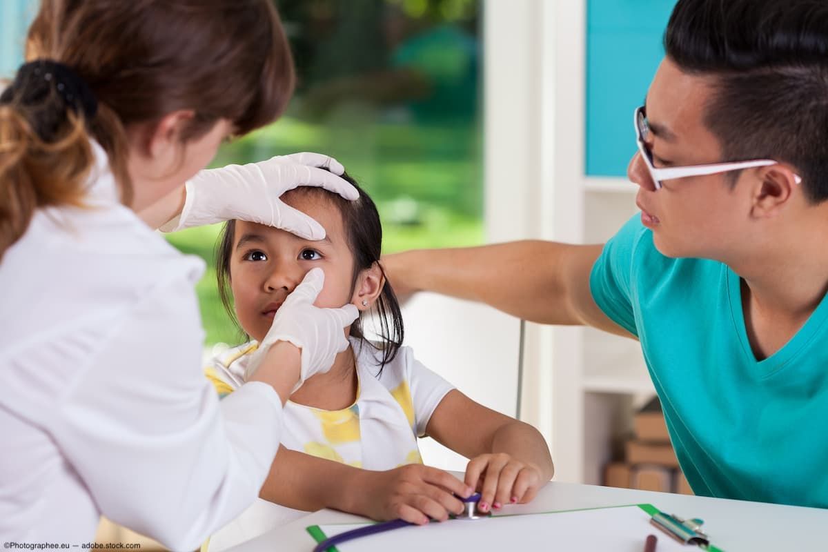 Physician examining pediatric patient's eye Image credit: ©Photographee.eu - adobe.stock.com