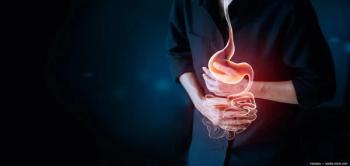 Man grabbing stomach with gut graphic overlay Image credit: ©ipopba - adobe.stock.com