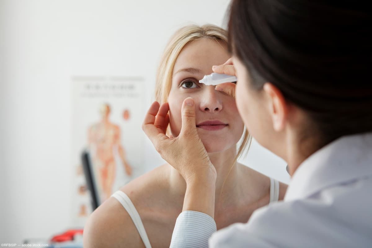 Physician administering eye drop for patient. Image credit: AdobeStock/RFBSIP