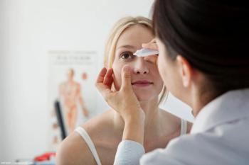 Physician administering eye drop for patient. Image credit: AdobeStock/RFBSIP