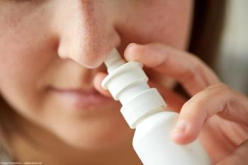 Nasal spray being applied in nose Image credit: AdobeStock/SydaProductions