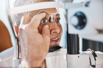 Patient receiving retinal exam Image credit: AdobeStock/Coetzee/peopleimages.com