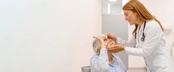 Physician administering eye drop into patient's eye Image credit: AdobeStock/MoonSafari