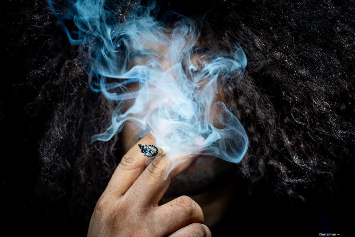 Man smoking a joint Image credit: AdobeStock/lesterman