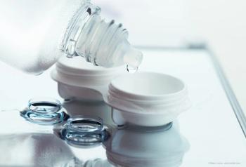 rigid gas permeable contact lens with case and solution