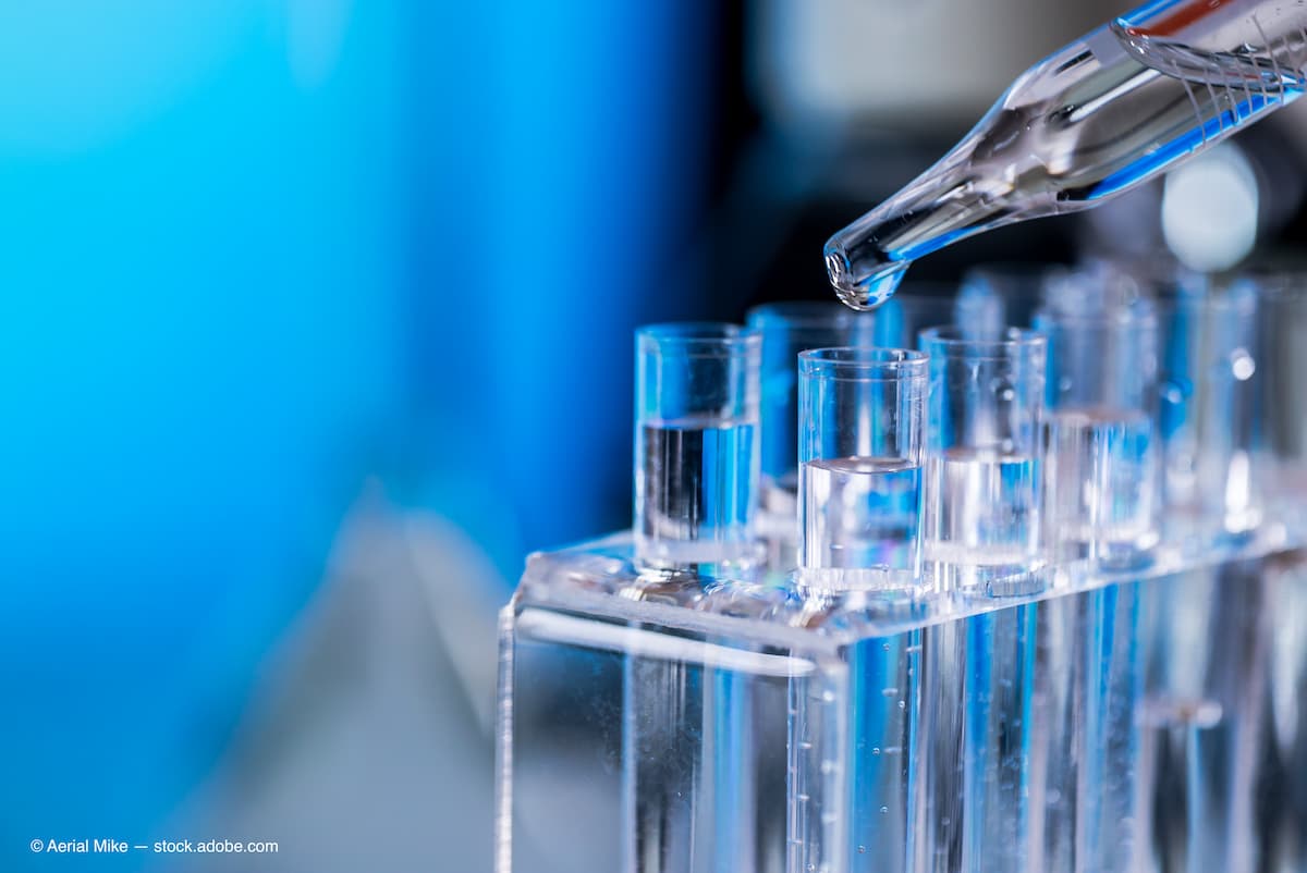 Solution being administered into test tubes Image credit: AdobeStock/AerialMike